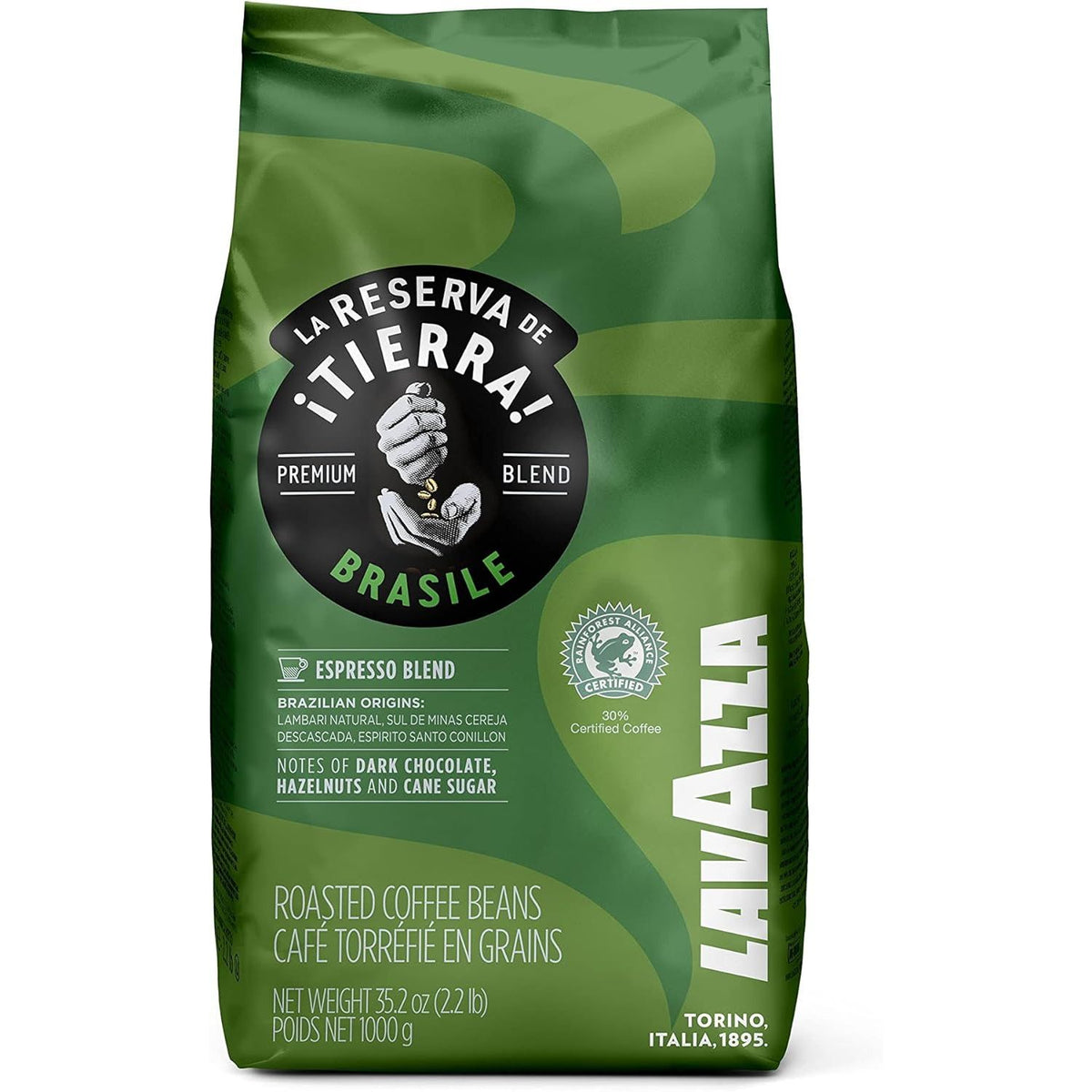 A 1000g bag of Lavazza Italia 'La Reserva de Tierra! Brasil' espresso blend coffee beans, featuring a green and dark green packaging design with a black circular logo.